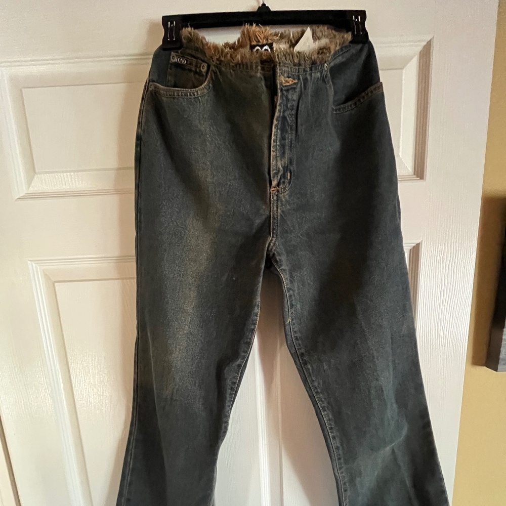 XOXO Jeans, Size 9/10,Faded Blue with Fraying on the bottom cuffs and waist area